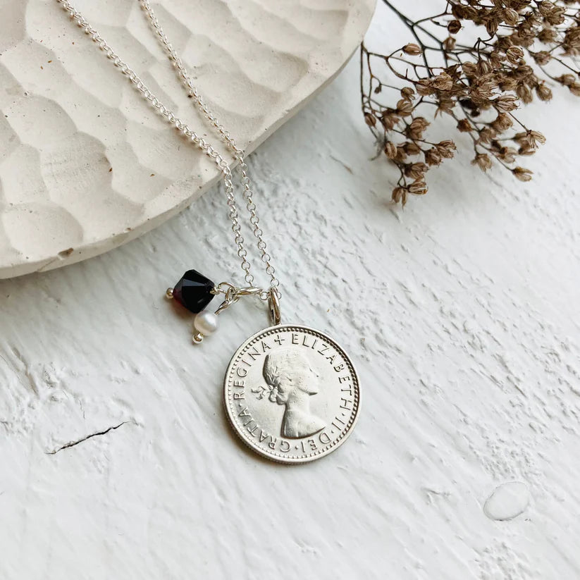 Heads side of Queen Elizabeth II sixpence necklace with garnet and pearl charm - sterling silver chain