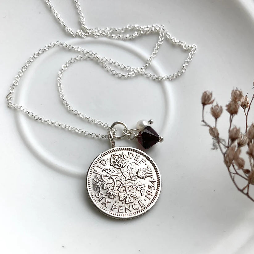 1954 British silver coin pendants by Prenoa to celebrate a 70th birthday. Garnet birthstone and sterling silver rolo chain