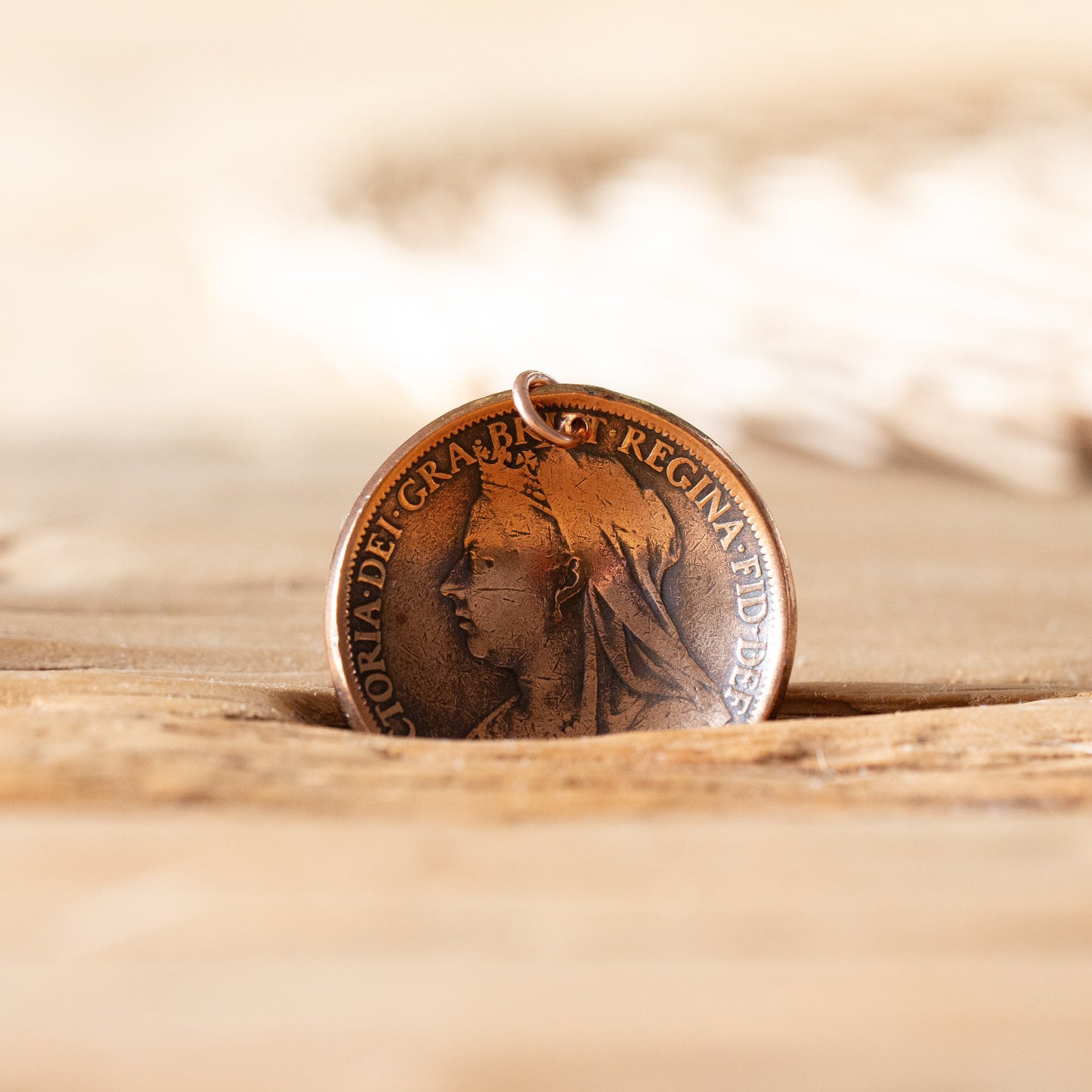 Old penny charm.