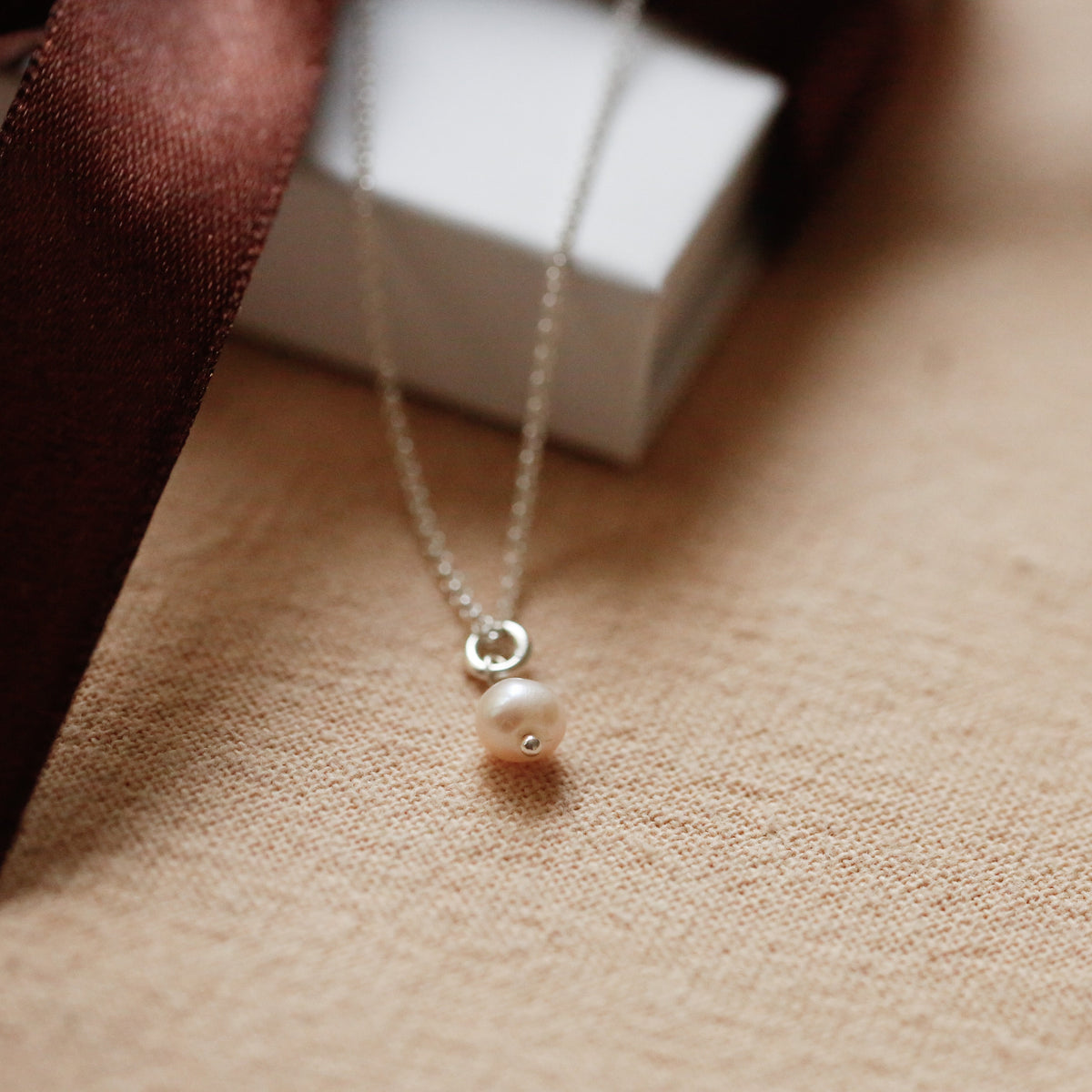 Infinity Pearl Necklace