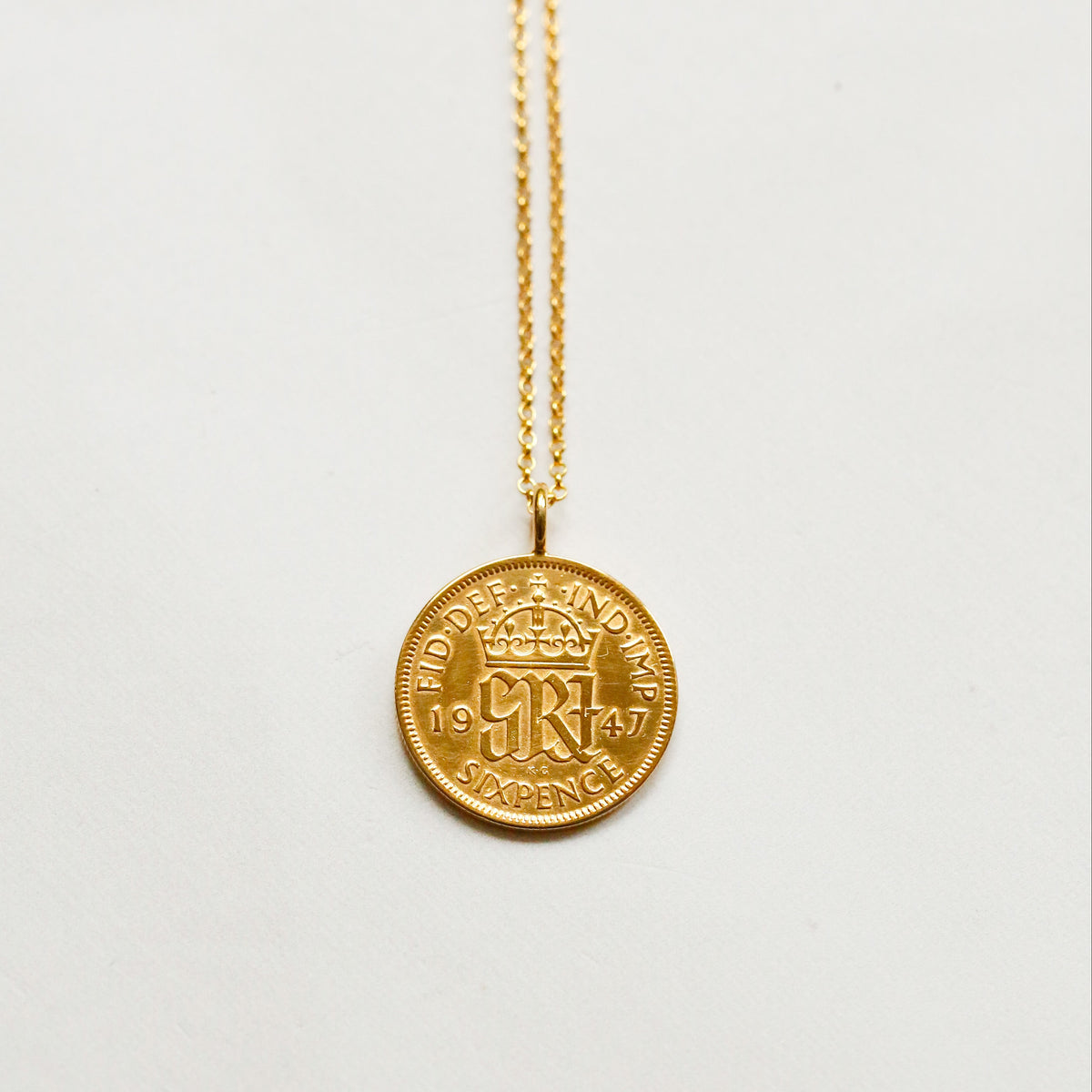Gold plated real British Christmas sixpence pendant on a gold chain. 