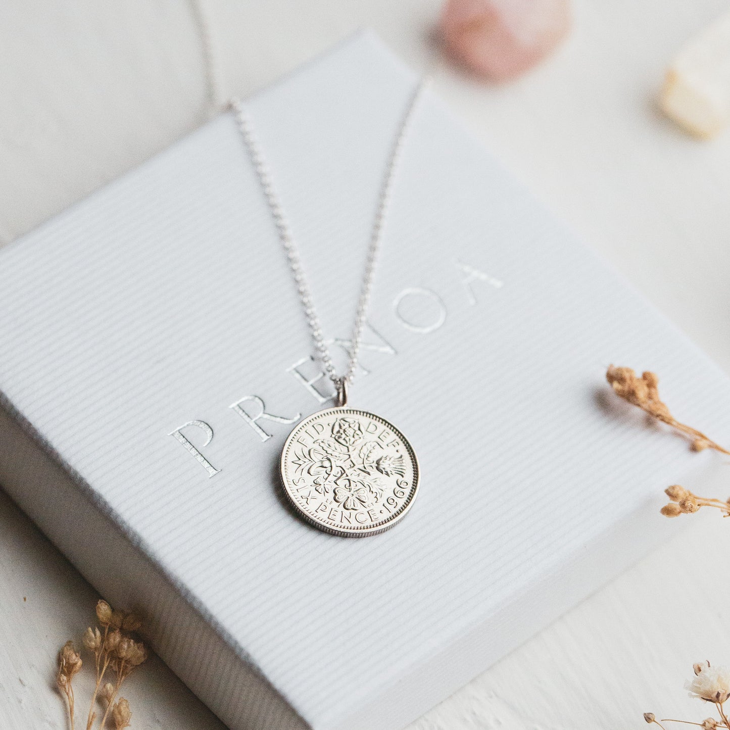 60th birthday gift: Silver sixpence pendant with sterling silver chain, featuring HM Queen Elizabeth II on a white Prenoa gift box background.