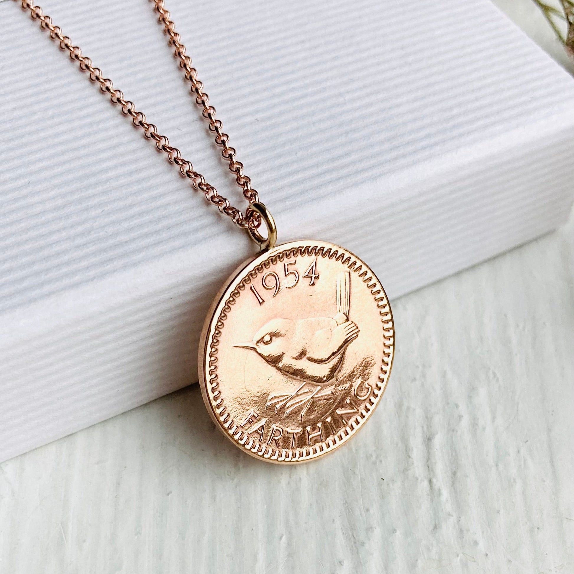 Bronze coin pendant with British farthing and wren coin on a rose gold chain