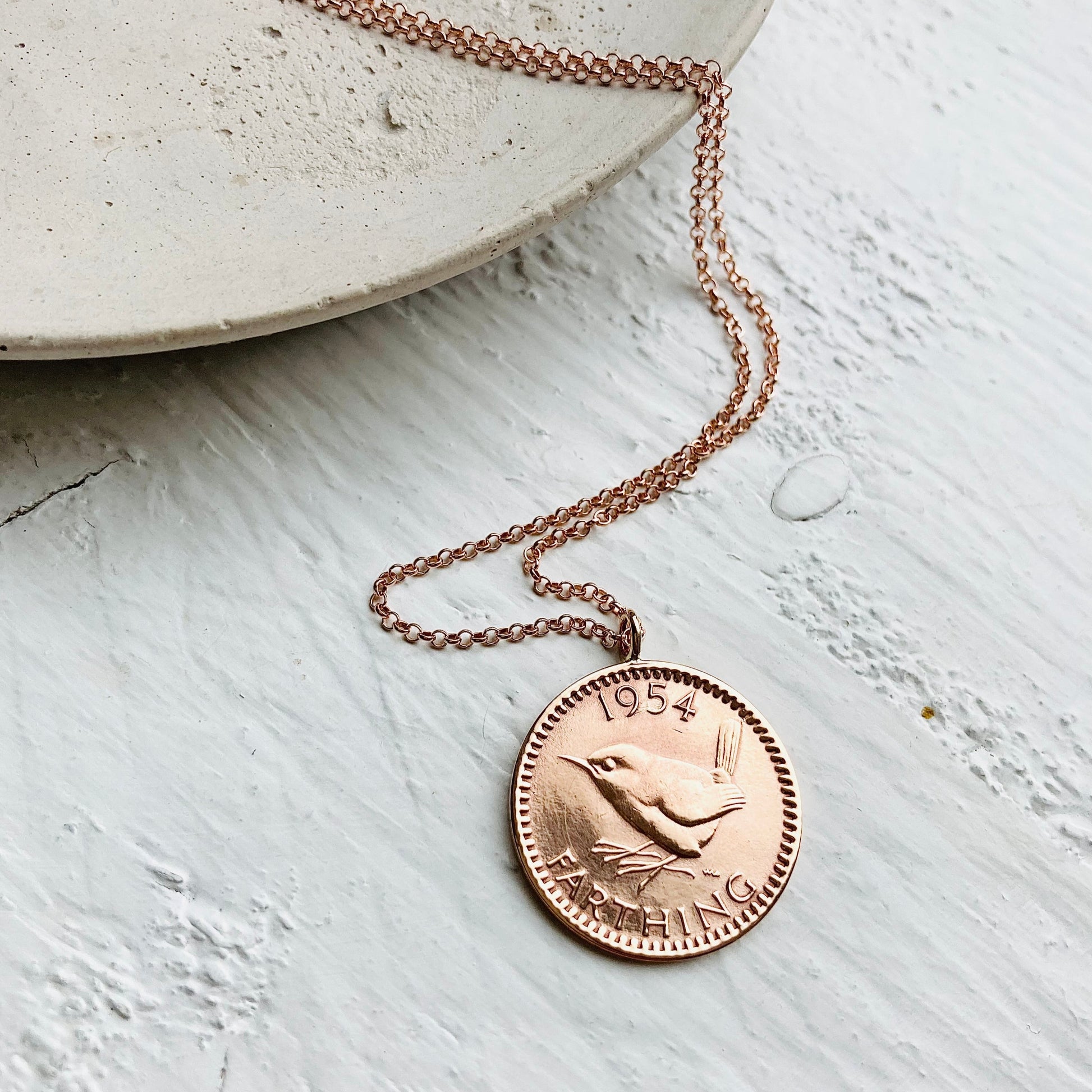 70th birthday gift, 1954 dated wren British farthing coin necklace made by Prenoa on a rose gold chain