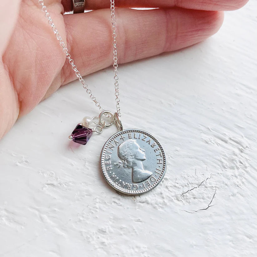 Heads side of 1954 Sixpence Necklace pendant with amethyst and pearl charm to celebrate a 70th birthday in February