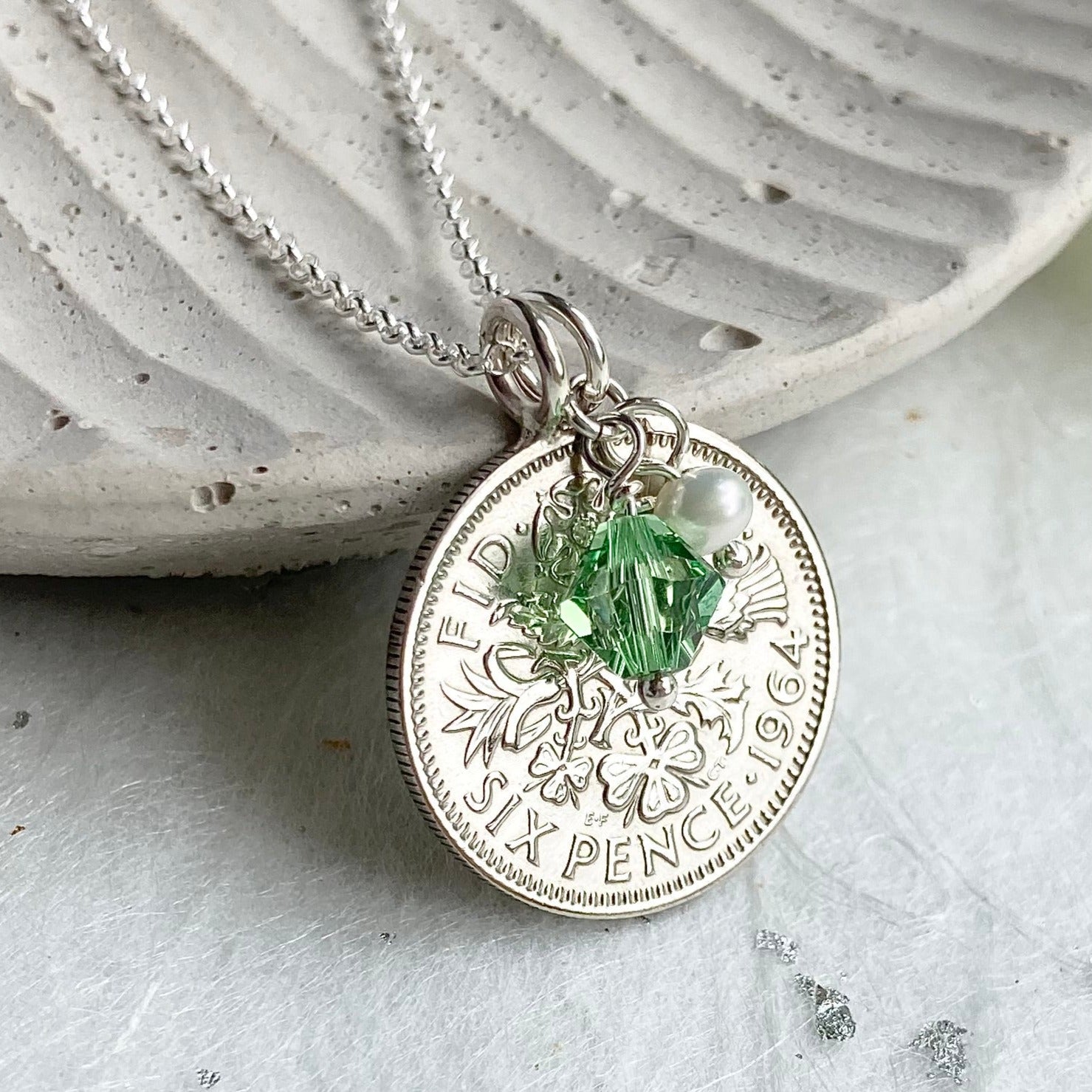 1964 sixpence pendant necklace with peridot charm