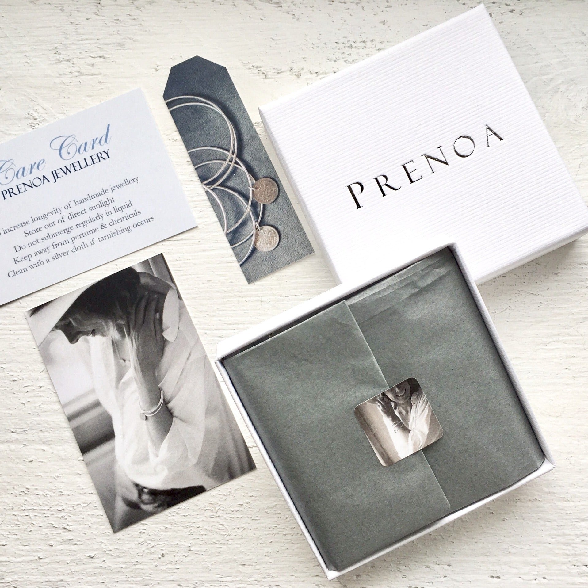 Prenoa gift boxes are included with all coin jewellery